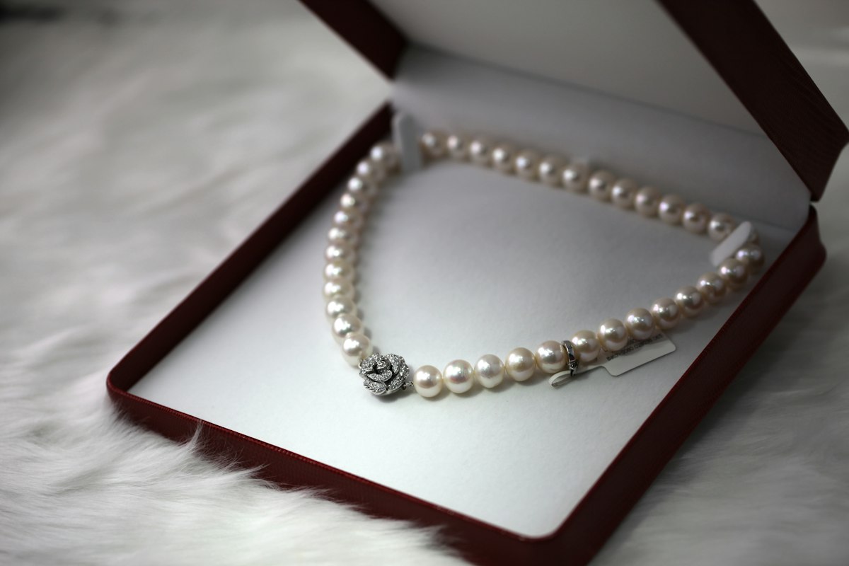 Pearl necklace in an open gift box