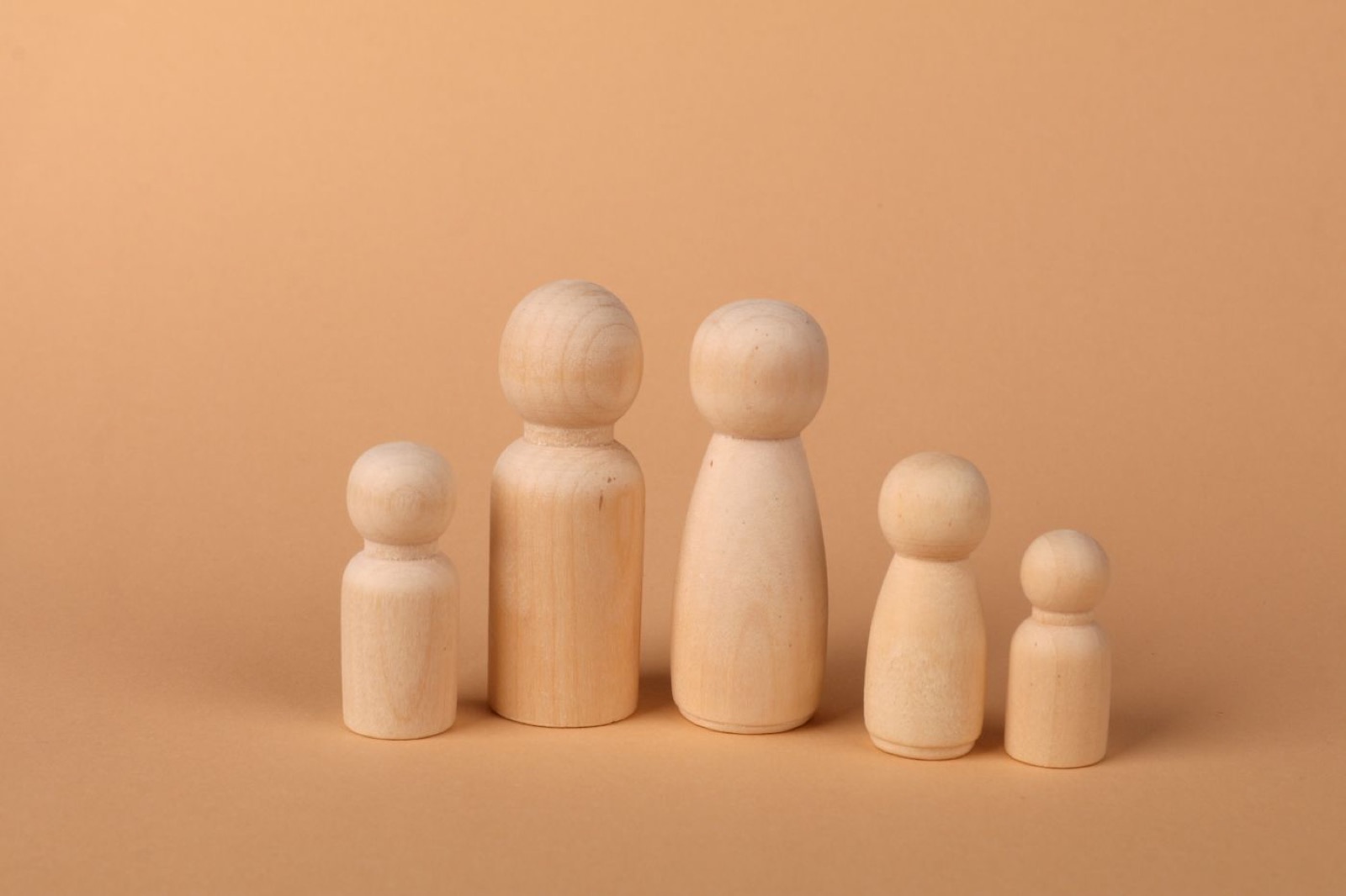 Small unpainted wooden figures